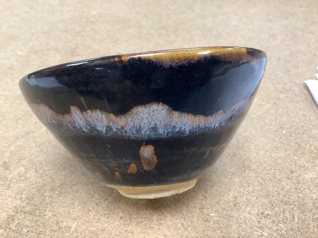 A Chinese blackware splashed bowl 11cm diam